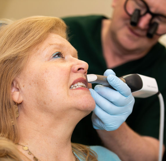 dental patient undergoing cerec scan St. Johns, MI
